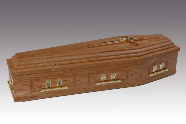 Panelled solid oak coffin, finished in a high gloss and fitted with woodbar metal handles and a superior interior.