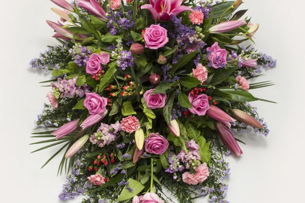 A beautiful arrangement of Lilies, Roses, September Flowers, Hypericum Berries, Stocks, Lisianthus and fresh greenery. From €175.