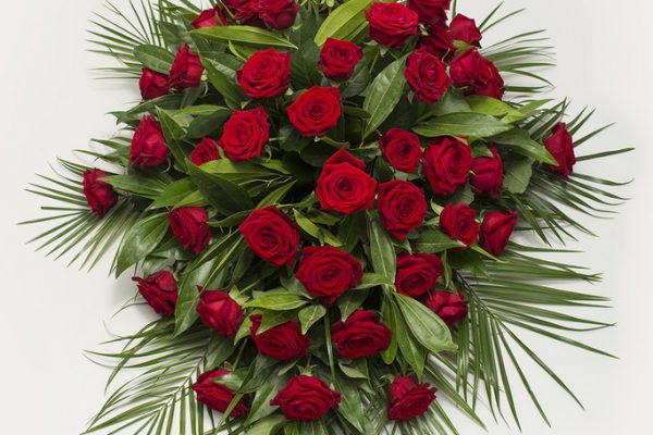 A classic combination of Red Roses and carefully selected greenery. From €220.