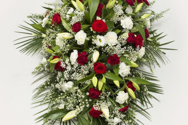 An elegant arrangement of Lilies, Roses, September Flowers, Carnations, Lisianthus, Gypsophila and greenery. From €180.