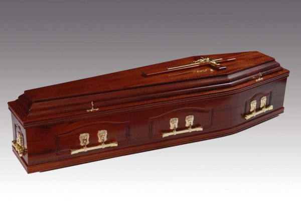 Panelled solid mahogany coffin, finished in a high gloss and fitted with brass finished metal handles and a superior interior.